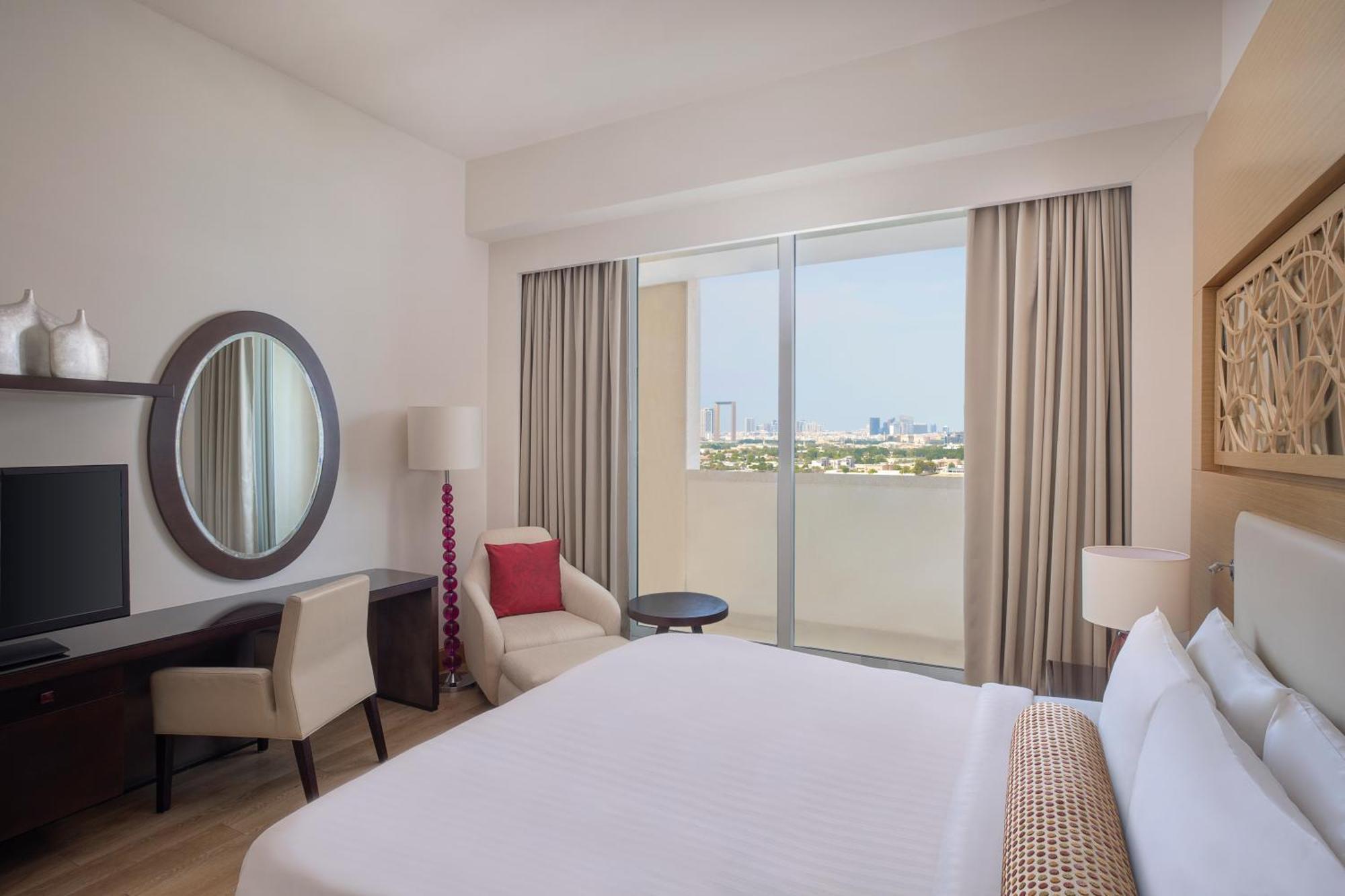 Marriott Executive Apartments Al Jaddaf, Дубай Экстерьер фото A bedroom at the hotel