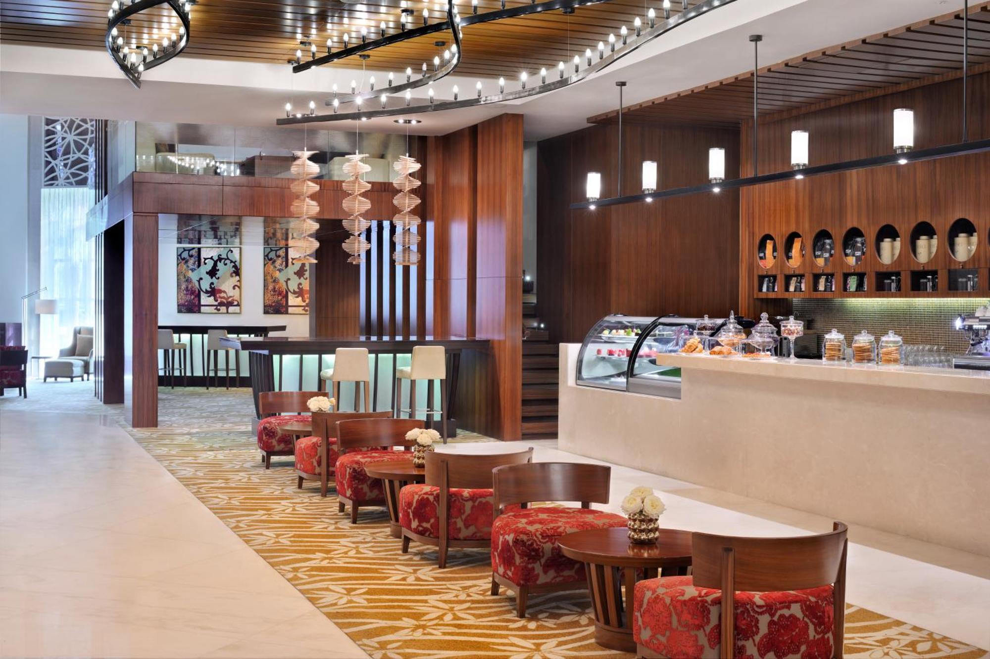Marriott Executive Apartments Al Jaddaf, Дубай Экстерьер фото The Lounge at the airport